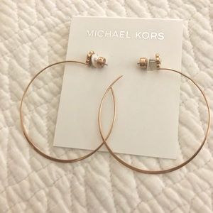 Michael Kors hoop earrings.